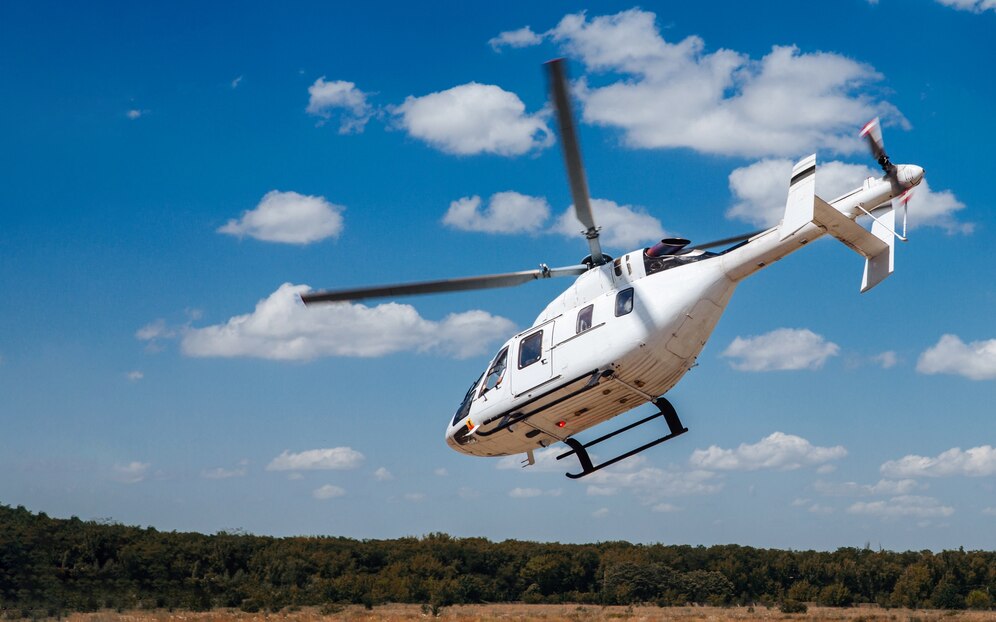 white-helicopter-takes-off-from-runway